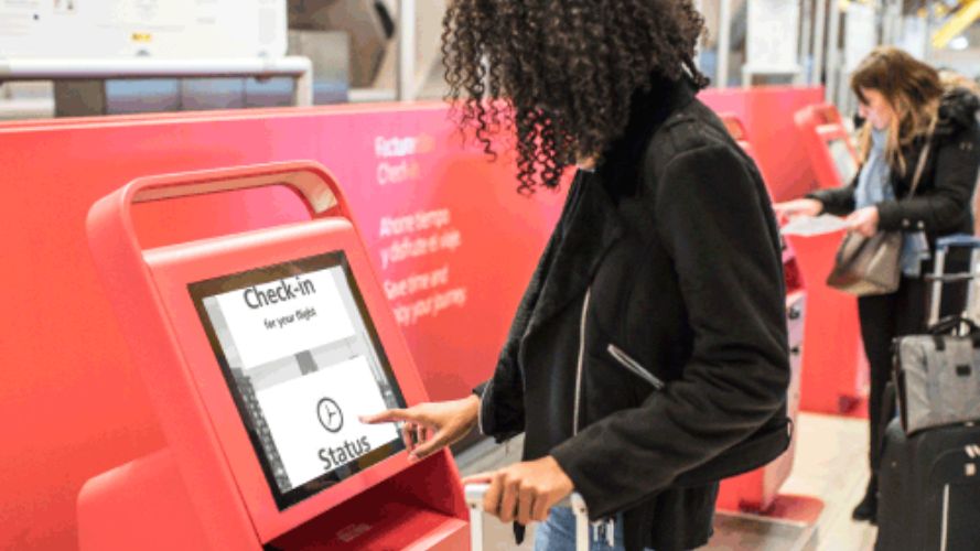 Accessible self service kiosk with enlarged text on screen.